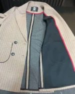 نمای نزدیک دوخت تمیز و نواردوزی داخلی کت زنانه فاستونی