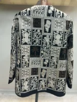 نمای پشت مانتو کتی قلاب دوزی طرح موتیف مشکی